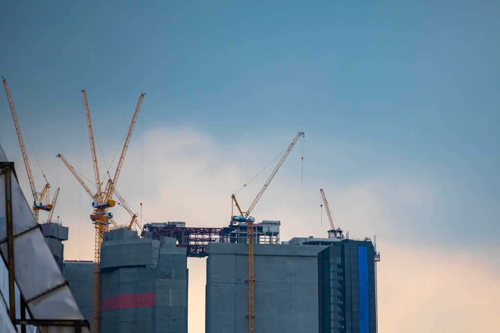 construction site building with crane, skyscraper building construction